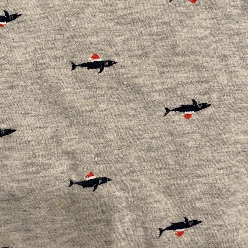 Shark wearing Santa hats long sleeve tee.